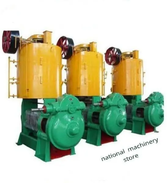 Row of three high capacity oil expellers with yellow seed hoppers and green gear housings